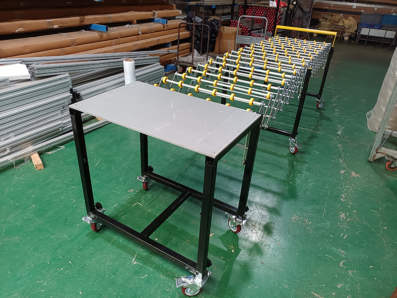 新款福来轮伸缩机一端带板状工作台.jpg 新款福来轮伸缩机一端带板状工作台.jpg